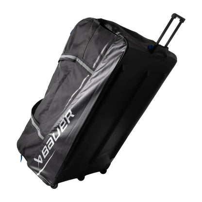 Bauer Premium S24 Wheeled Goalie Bag, Black, extended handle angle, model 1063634